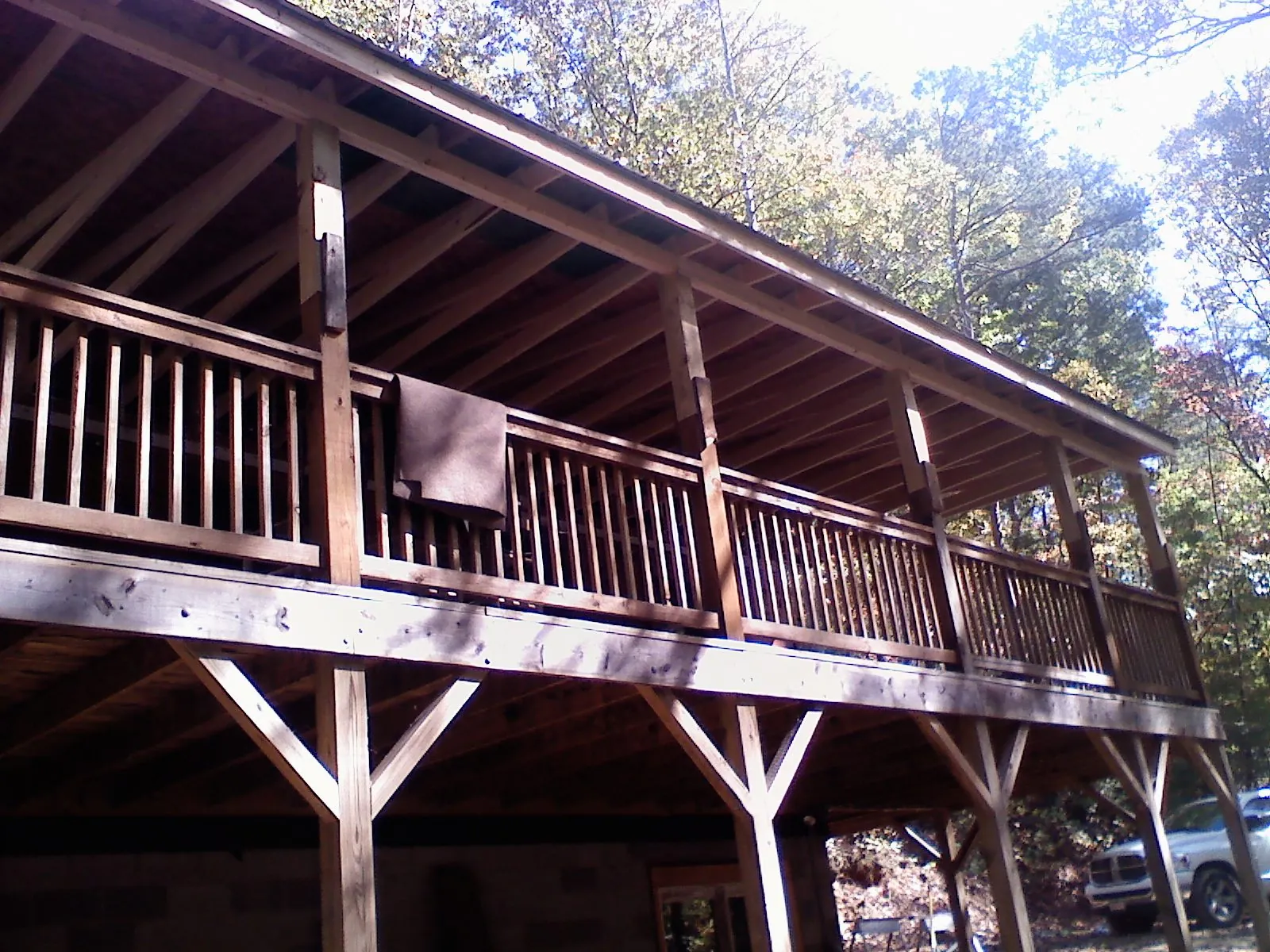 Timber framing under a new elevated porch and deck — Roof Leak Repair in Millbury by Roofing Brothers